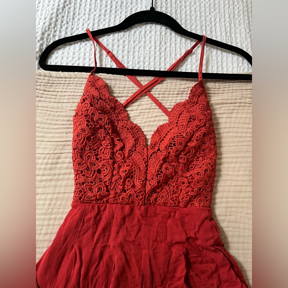Orange romper with embroidery